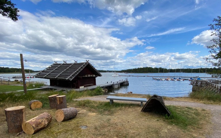 Exterior view from Pentala island - the picture shows the beach museum cottage, the sea and the terrain.