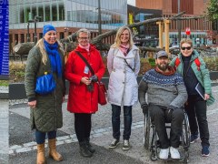 Three different photos with a guide, man in wheelchair and group